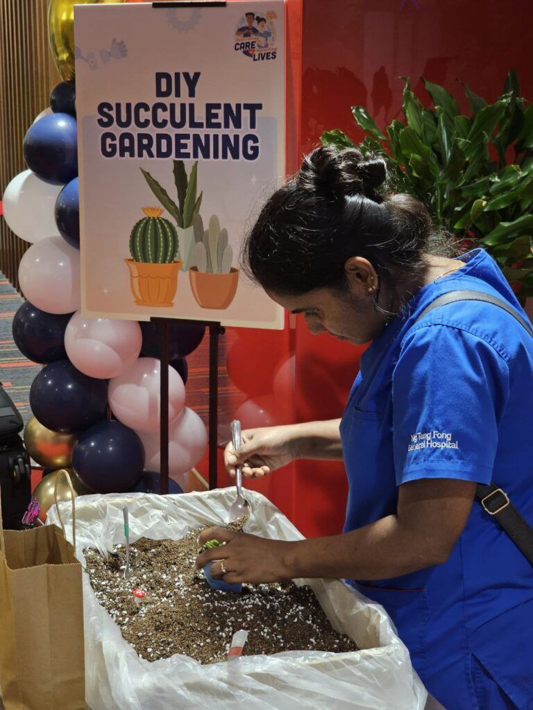 DIY succulent gardening activity station at the Nurses Day event